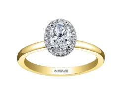 BAGUE EN OR 18K/PALLADIUM SERTIE DpiUN DIAMANT CANADIEN OVAL ET DE DIAMANTS