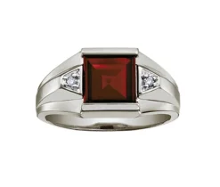 BAGUE EN OR SERTIE DpiUN GRENAT ET DE DIAMANTS