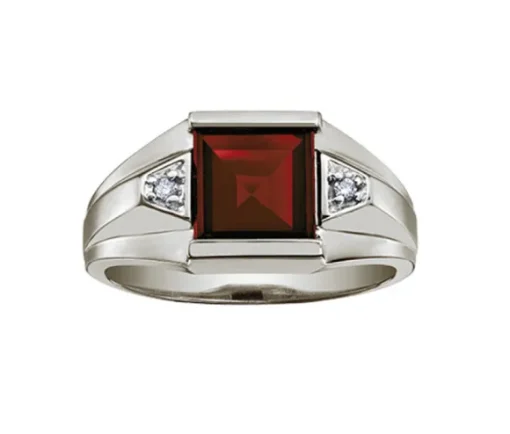 BAGUE EN OR SERTIE DpiUN GRENAT ET DE DIAMANTS