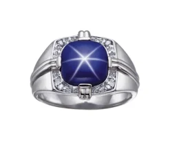 BAGUE EN OR SERTIE DpiUN SAPHIR ÉTOILÉ ET DE DIAMANTS