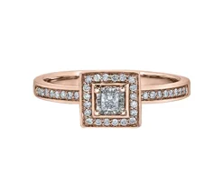 BAGUE EN OR SERTIE DpiUN DIAMANT CANADIEN ET DE DIAMANTS