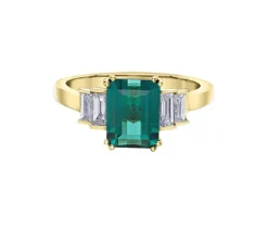 BAGUE EN OR SERTIE DpiUNE TOURMALINE BLEUE ET DE DIAMANTS