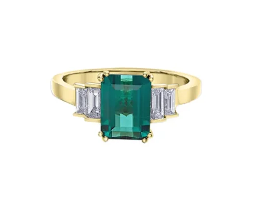 BAGUE EN OR SERTIE DpiUNE TOURMALINE BLEUE ET DE DIAMANTS