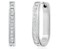 BOUCLES HUGGIES OVALES EN ACIER SERTIES DE CUBIQUES ZIRCONIAS