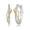 BOUCLES HUGGIES OVALES EN ARGENT RHODIÉ/PVD OR 2 TONS SERTIES CDE CUBIQUES ZIRCONIAS