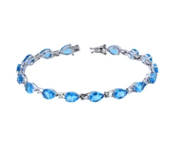 BRACELET EN ARGENT RHODIÉ SERTI DE TOPAZES BLEUS