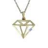 PENDENTIF EN OR À MODÈLES AJOURÉS VARIÉS SERTI DpiUN DIAMANT