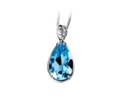 PENDENTIF EN OR BLANC SERTI DpiUN TOPAZE BLEU ET DE DIAMANTS