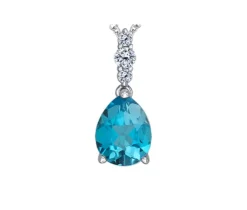 PENDENTIF EN OR BLANC SERTI DpiUN TOPAZE BLEU ET DE DIAMANTS CANADIENS