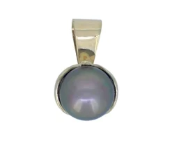 PENDENTIF EN OR 18K JAUNE SERTI DpiUNE PERLE DES MERS DU SUD