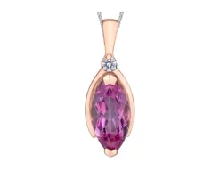 PENDENTIF EN OR ROSE SERTI DpiUN TOPAZE ROSE ET DE DIAMANTS